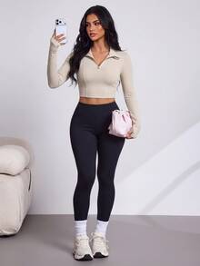 Easithlete Women's Sports Sweatshirt Ribbed High Elastic Fitness Casual Long Sleeve Pullover With Front Zipper - Khaki - View 1