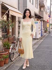 Skyraze 女款黃色兩件套：不對稱下擺上衣與低腰美人魚裙，飾有蝴蝶結 - 淡黃色 - 查看 1