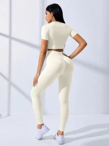 SHEIN Core Rhythm 2件套高弹无缝女士纯色插肩短袖露脐T恤和紧身裤运动套装，女士塑形运动服，女士紧身裤和上衣套装，女士紧身裤套装，2件套速干运动套装，女士健身服套装，2件套健身套装，紧身裤套装，2件套健身套装，瑜伽运动服套装，女士运动套装，夏季女士套装 - 米色 - 查看 5