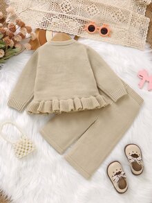 SHEIN Playful Pals 女嬰針織毛衣套裝 蝴蝶結圓領長袖開襟衫 素色百搭時尚款 + 針織喇叭長褲 適合秋冬季節 2件套 時尚百搭 適合外出旅行上學 - 杏色 - 查看 2