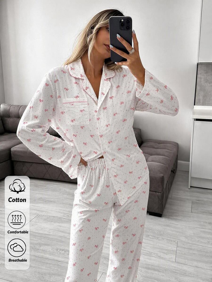 SHEIN طقم بيجامة نسائي قطعتين من ملابس علوية بأكمام طويلة وياقة وأزرار أمامية بطبعة فيونكة ونقاط بولكا وبنطال مطابق، ناعم وكاجوال بقصة مريحة وفضفاضة - ابيض واحمر - مشاهدة 1