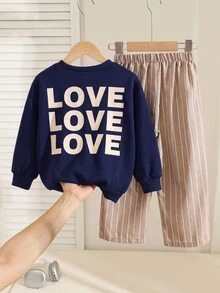 Bộ đồ trẻ em nam phong cách thường ngày gồm áo nỉ tay dài in chữ và quần dài kẻ sọc - Màu xanh hải quân - Xem 5