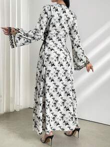 Al Najma Women's V-Neck Butterfly Printed Arabesque Long Flared Sleeve Modest Dress - Black and White - View 3