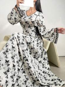 Al Najma Women's V-Neck Butterfly Printed Arabesque Long Flared Sleeve Modest Dress - Black and White - View 8