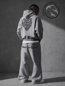 Manfinity EMRG Set Hoodie dan Celana Olahraga Pria dengan Bordir Slogan - Grey - View 1