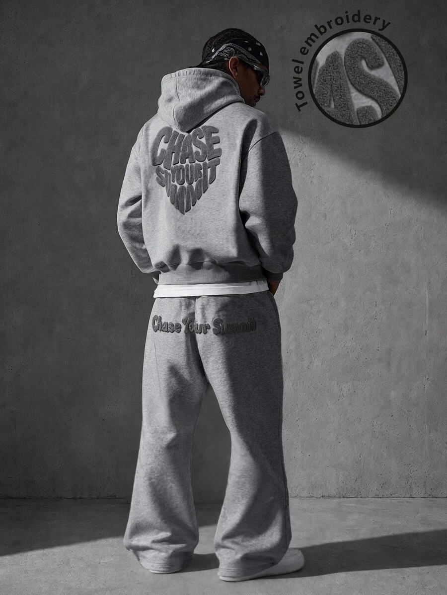 Manfinity EMRG Set Hoodie dan Celana Olahraga Pria dengan Bordir Slogan - Grey - View 1