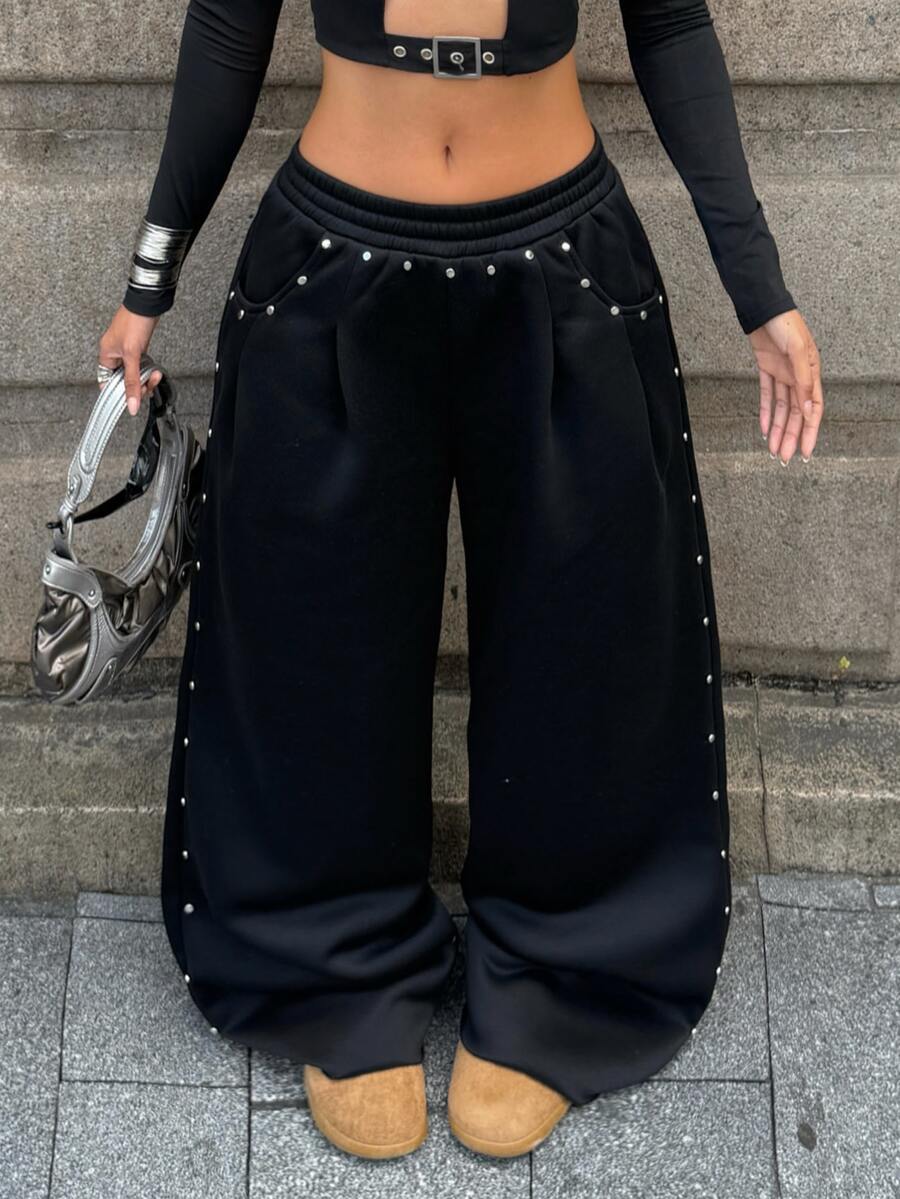 Coolane 女款秋冬怪誕搖滾街頭風運動休閒褲 復古Y2K時尚龐克學院風 外出酒吧派對穿搭 銀色鉚釘黑色寬鬆寬腿長褲