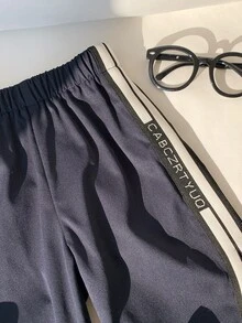 SHEIN 1件兒童小男孩休閒運動校園風黑色百搭時尚極簡實用柔軟舒適直筒長褲，創意字母織帶設計，適合日常穿著、上學、旅行、運動、街頭風，春夏秋冬四季皆宜 - 藏蓝色 - 查看 7
