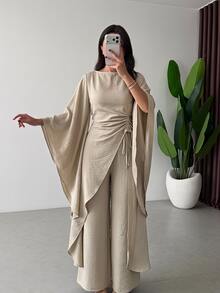 Siren Gaze طقم نسائي من قطعتين: قميص بحافة غير متماثلة مع رباط سحب وبنطال طويل بنسيج بارز - لون مشمشي - مشاهدة 1