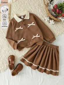 SHEIN 女童 2 件套套裝 4-7 歲，棕色華夫格針織 Polo 長袖上衣配蝴蝶結與百褶裙，秋冬棉質休閒服飾套裝 - 杏色 - 查看 3