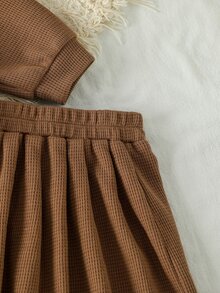 SHEIN 女童 2 件套套裝 4-7 歲，棕色華夫格針織 Polo 長袖上衣配蝴蝶結與百褶裙，秋冬棉質休閒服飾套裝 - 杏色 - 查看 8