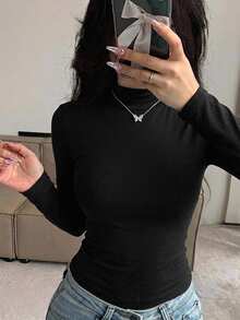 DAZY تي شيرت نسائي بتصميم بسيط بلون موحد وياقة نصف عالية وقصة ضيقة وأكمام طويلة ملابس منزلية للخريف - الأسود - مشاهدة 3