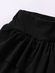 SHEIN 女童黑色迷你裙，雙層下擺，純色針織 A 字裙，內建短褲，日常穿著，秋季百搭 - 黑色 - 查看 6