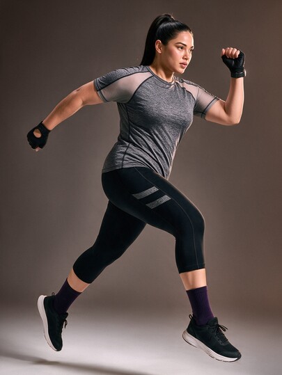 Powerista Women's Plus Size Workout Tee Gray Moisture Wicking Short Sleeve Performance Top With Mesh Detail For Sports And Cropped Leggings For Athletic Set