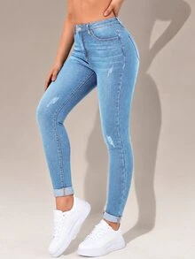 Flexra High-Waisted Button-Embellished Skinny Stretch Distressed Y2K Jeans - Light Wash - View 1