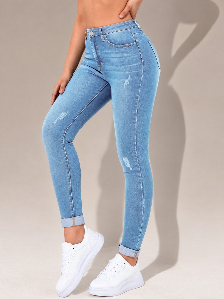 Flexra High-Waisted Button-Embellished Skinny Stretch Distressed Y2K Jeans - Light Wash - View 1
