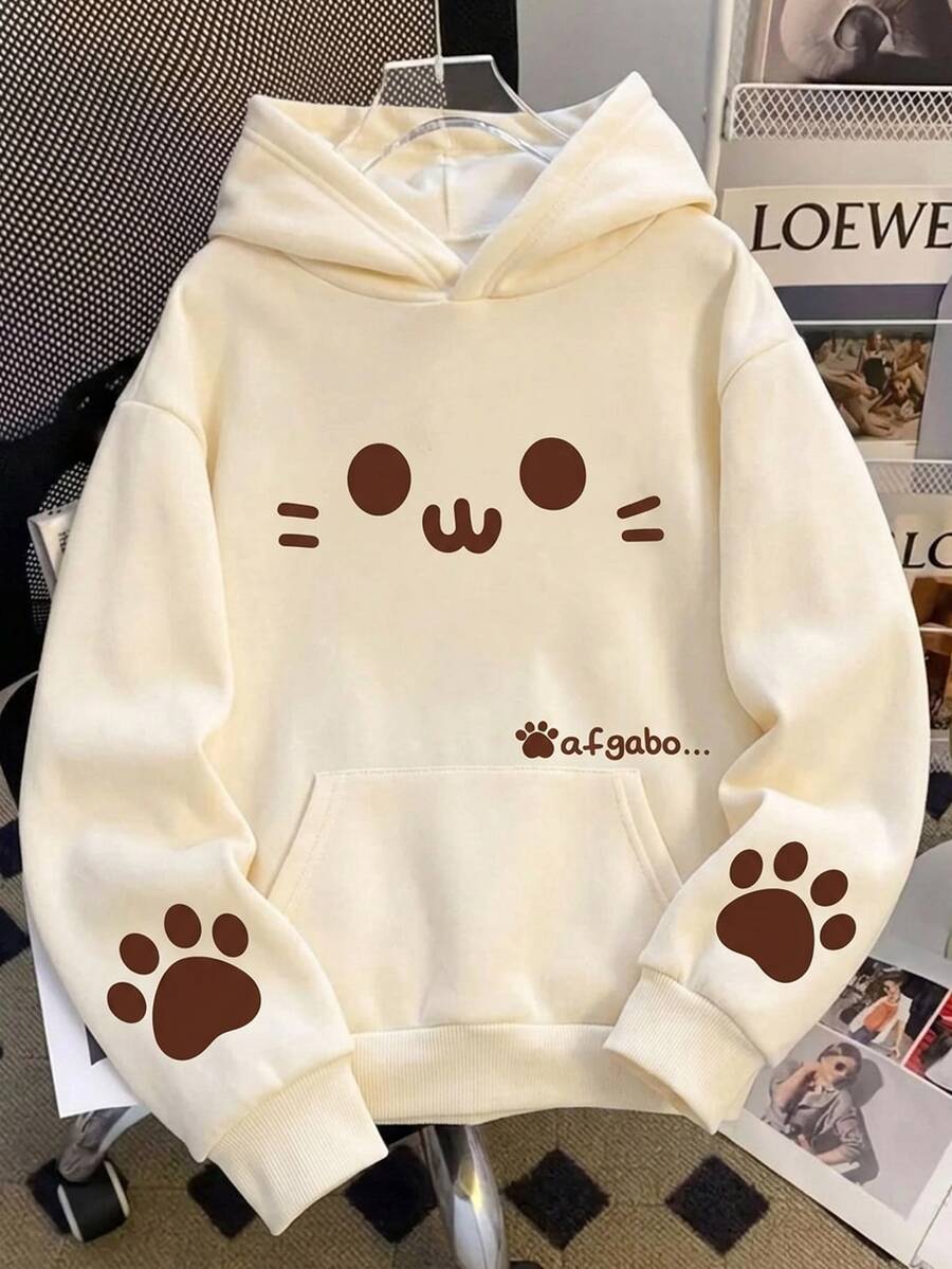 SHEIN 女童棕色與奶油色連帽衛衣,印有可愛卡通貓微笑臉,寬鬆落肩,袋鼠口袋,秋季校園風 - 米色 - 查看 1