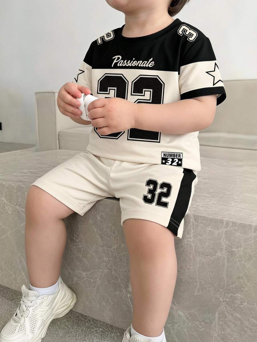 SHEIN 男嬰兩件套可愛卡通角色 Taz 印花柔軟短袖上衣 T-shirt 與短褲，夏季運動風，白色/米白色，保守熱帶風