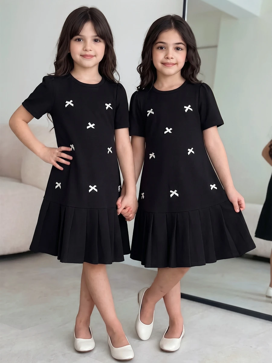 SHEIN Tween Girls 1pc Tween Girl Solid 3D Bow Short Sleeve Pleated Swing Mini Dress, Loose Fit, Spring/Summer Summer Holiday, Casual, Daily, Outfit - Black - View 1
