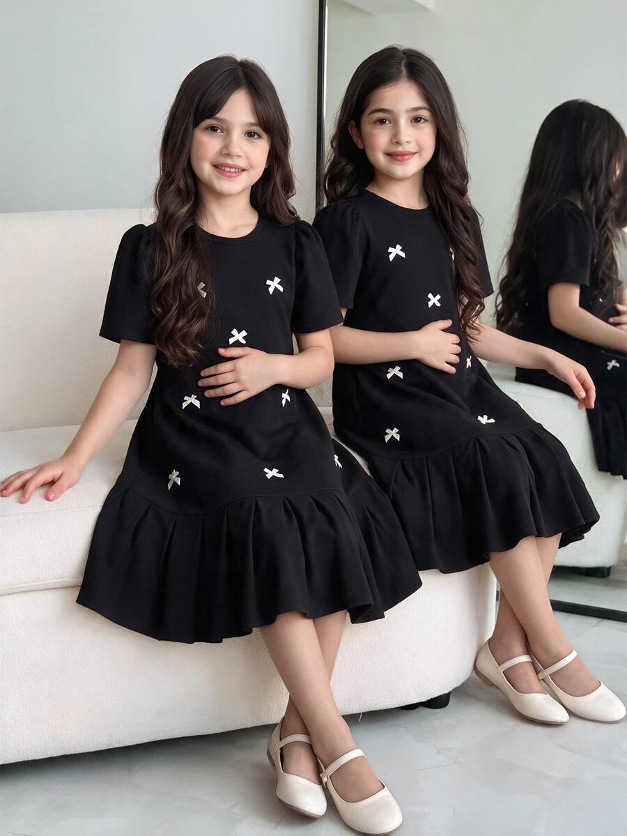 SHEIN 1 件 Tween Girl 纯色 3D 蝴蝶结短袖褶皱摆裙,宽松版型,春夏 - 黑色 - 查看 1