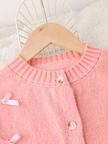 SHEIN 2 piezas/Set Conjunto de otoño para niña preadolescente: Elegante y lindo suéter de punto con lazo y falda de punto plisada, pulóver rosa pastel de despedida - Rosa - Ver 7