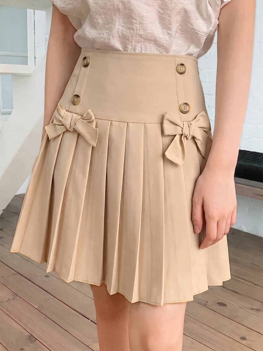 SHEIN BigGirls HighWaist PleatedSkort, SweetPreppy Skort WithBows & Decor Buttons, Built-In Anti-Chafing Liner, Great For FallWinter, School&Holiday Outfits - Khaki - View 1