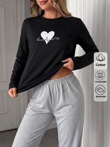 SHEIN طقم بيجامة نسائي مقاس كبير بتوب أكمام طويلة بطبعة قلب وبنطلون طويل بنقشة كاروهات - أبيض وأسود - مشاهدة 1