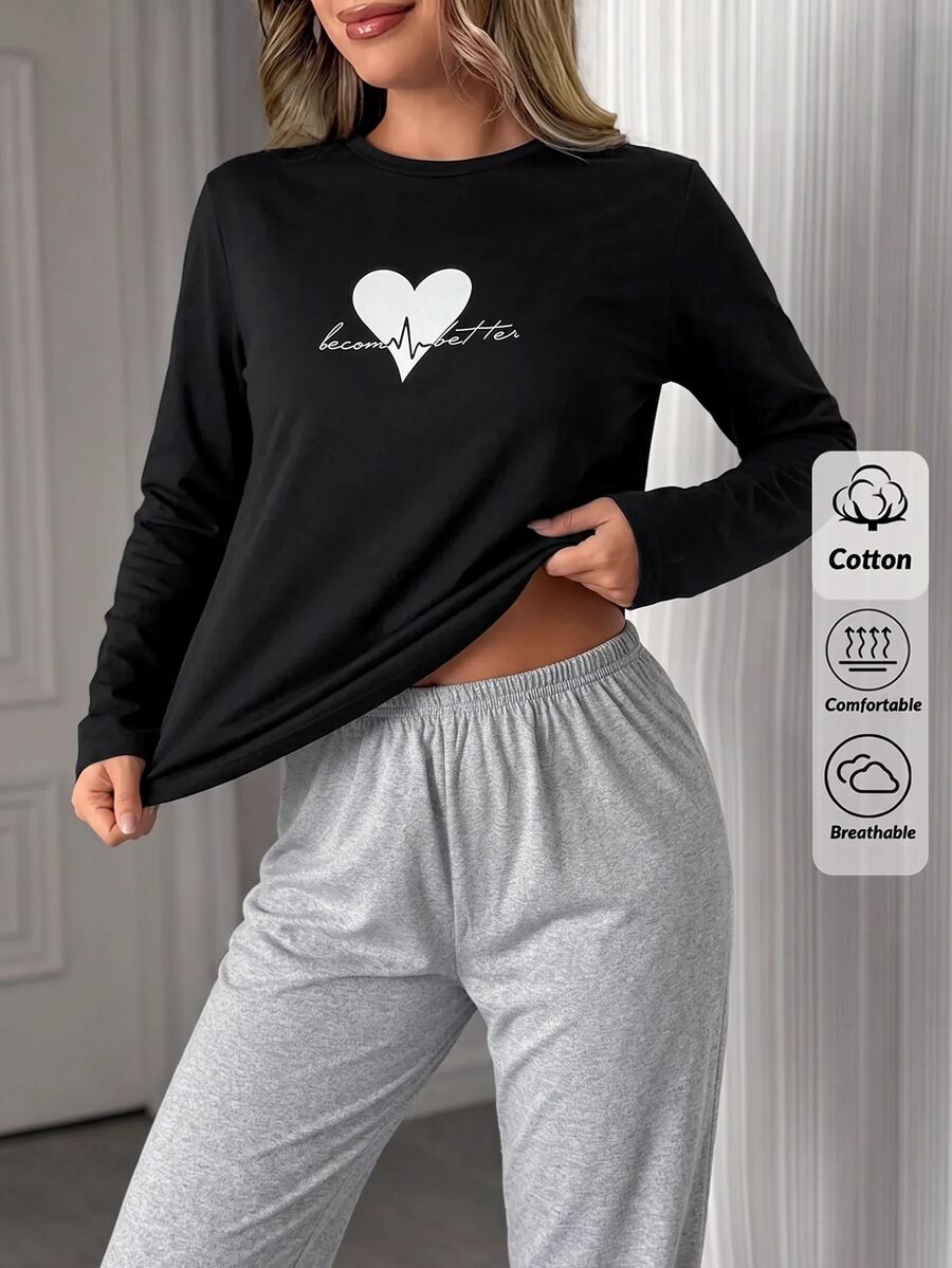 SHEIN طقم بيجامة نسائي مقاس كبير بتوب أكمام طويلة بطبعة قلب وبنطلون طويل بنقشة كاروهات - أبيض وأسود - مشاهدة 1