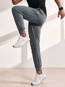 Driftmere Men Stretch Loose Fit Jogger Pants, Elastic Waist Athletic Workout Trousers With Zipper Pockets, Everyday Casual Outfit - Grey - View 2