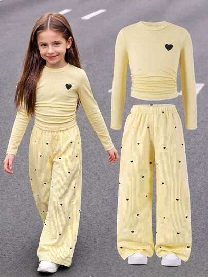Casuvi Kids Conjunto de 2 peças para rapariga de outono/inverno com calças largas às riscas de manga comprida e corte slim, top preto plissado de manga comprida curto, combinado com calças largas brancas com cavaleiro e riscas verticais, cavaleiro preto, criando um perfeito e um conjunto simples, casual e estiloso para rapariga