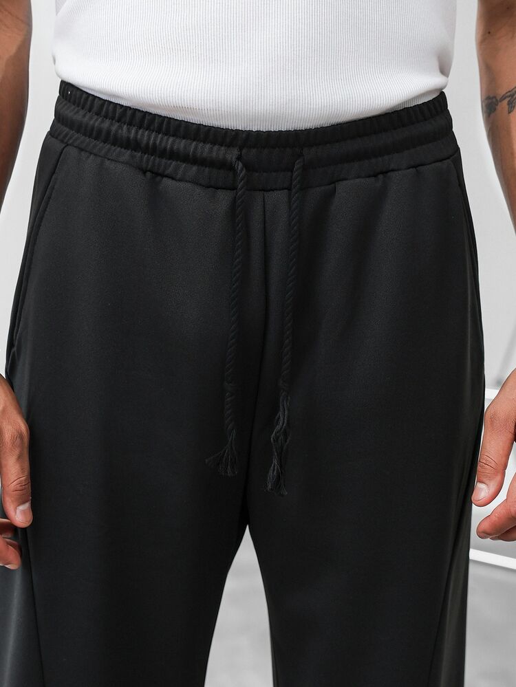 Claim Dot Pantalones de chándal casuales y versátiles, sueltos y con cordón, cómodos para hombres - Negro - Añade 8