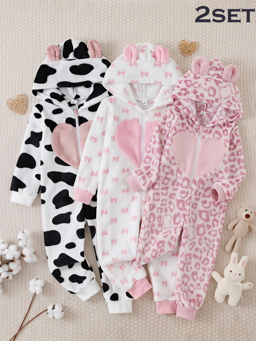 女童幼兒可愛俏皮秋冬雙面法蘭絨連帽拉鍊連身家居服,黑白奶牛紋與白色蝴蝶結印花,胸前大心裝飾,寬鬆柔軟保暖舒適居家睡衣,FW 抓絨內裡保暖 - 淺粉色 - 查看 1