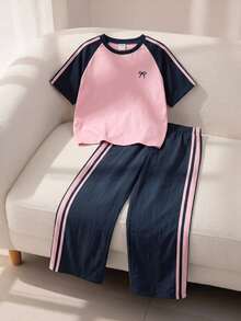 SHEIN Conjunto de 2 piezas para niñas preadolescentes: camiseta de cuello redondo y shorts deportivos cortos, ropa activa colorblock rosa y verde oscuro, manga corta, para escuela, jogging y verano - Azul Marino - Ver 2