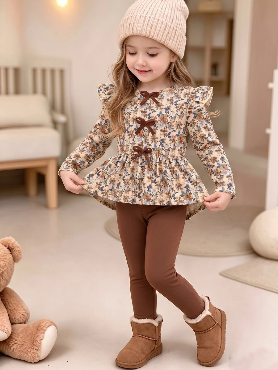 SHEIN 2pcs/Set Girls Toddler Outfit, Sweet Pastoral Style, All-Over Ditsy Floral, Ruffle Shoulder, Bowknot Decor, Long Sleeve Top With Gathered Hem And Solid Color Pants, Soft Textured Fabric, Exquisite Girls Two Pieces Set, Suitable For Daily Wear, Outdoor Activities, Spring And Autumn Versatile Outfit - Brown - View 1