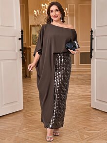Reflora طقم نسائي أنيق من قطعتين بمقاسات كبيرة، بلوزة بلون موحد بحافة غير متماثلة وكتف غير متماثل مع تنورة مزينة بالترتر - بني - مشاهدة 1