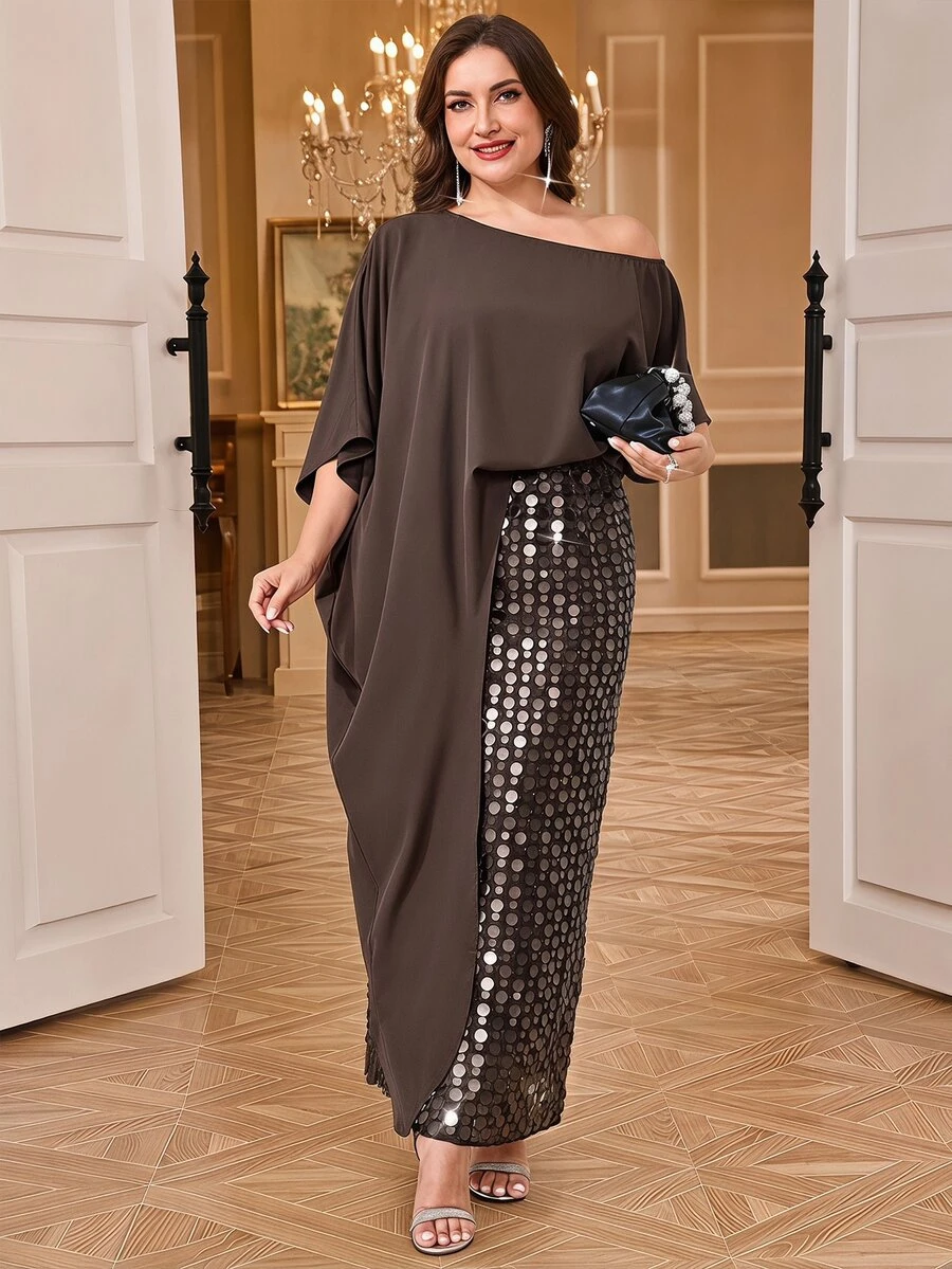 Reflora طقم نسائي أنيق من قطعتين بمقاسات كبيرة، بلوزة بلون موحد بحافة غير متماثلة وكتف غير متماثل مع تنورة مزينة بالترتر - بني - مشاهدة 1