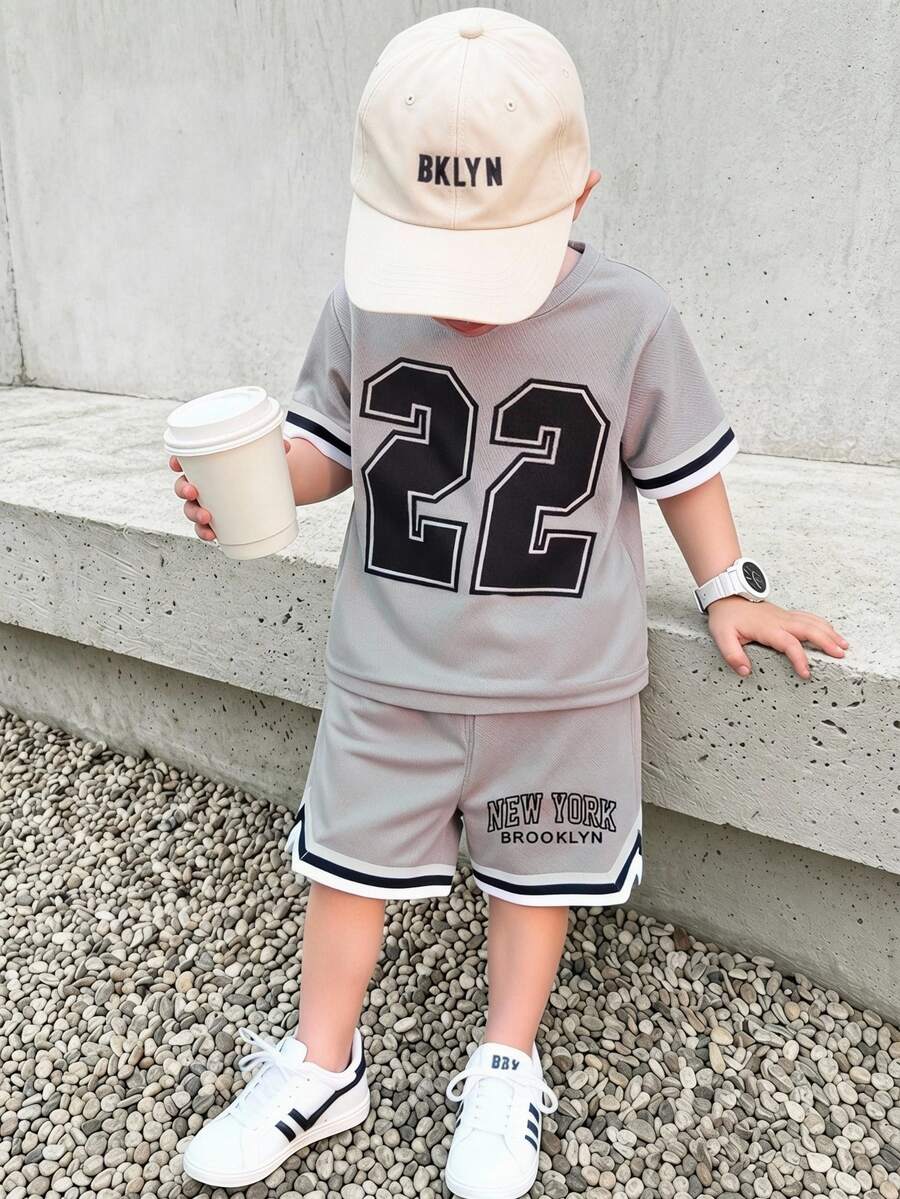 SHEIN 2pcs/Set Young Boy Sports & Casual Summer Numeric Print T-Shirt And Shorts Outfit,Round Neck Short Sleeve Jersey Style Basketball Clothes For Kids