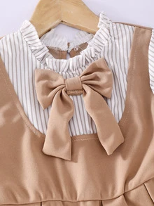 SHEIN فستان قصير ضيق 2 في 1 للفتيات الصغيرات بلون مشمش سادة، بياقة واقفة وأكمام طويلة، مع حافة مكشكشة وكسرات، لطيف - لون مشمشي - مشاهدة 7