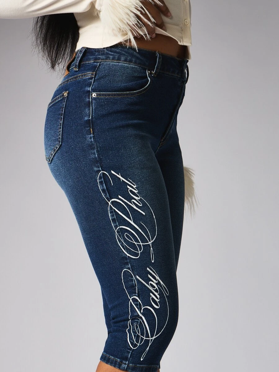 BABYPHAT High Rise Skinny Cropped Denim Jeans With Side Leg Graphic Embroidery Print Detail And Classic Five Pocket Design - Dark Wash - View 1