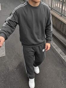 2件組 男士青少年秋冬抓絨內裡加厚街頭風花卉滿版印花連帽衛衣套頭衫與直筒運動長褲套裝，適合街頭穿搭，中性款 - 彩色 - 查看 1