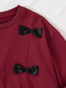 SHEIN طقم ملابس رياضية كاجوال للفتيات المراهقات بقطعتين، ملابس علوية سويت شيرت بفيونكة وزيادة كتف منسدل مع بنطال رياضي، 60% قطن، لون سادة - عنابي اللون - مشاهدة 6