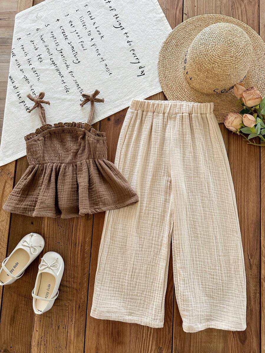 SHEIN LMoss Kids Conjunto de 2 piezas con top de halter de unicolor tejido y pantalones anchos casuales para niña joven de LMoss - Albaricoque - Ver 1