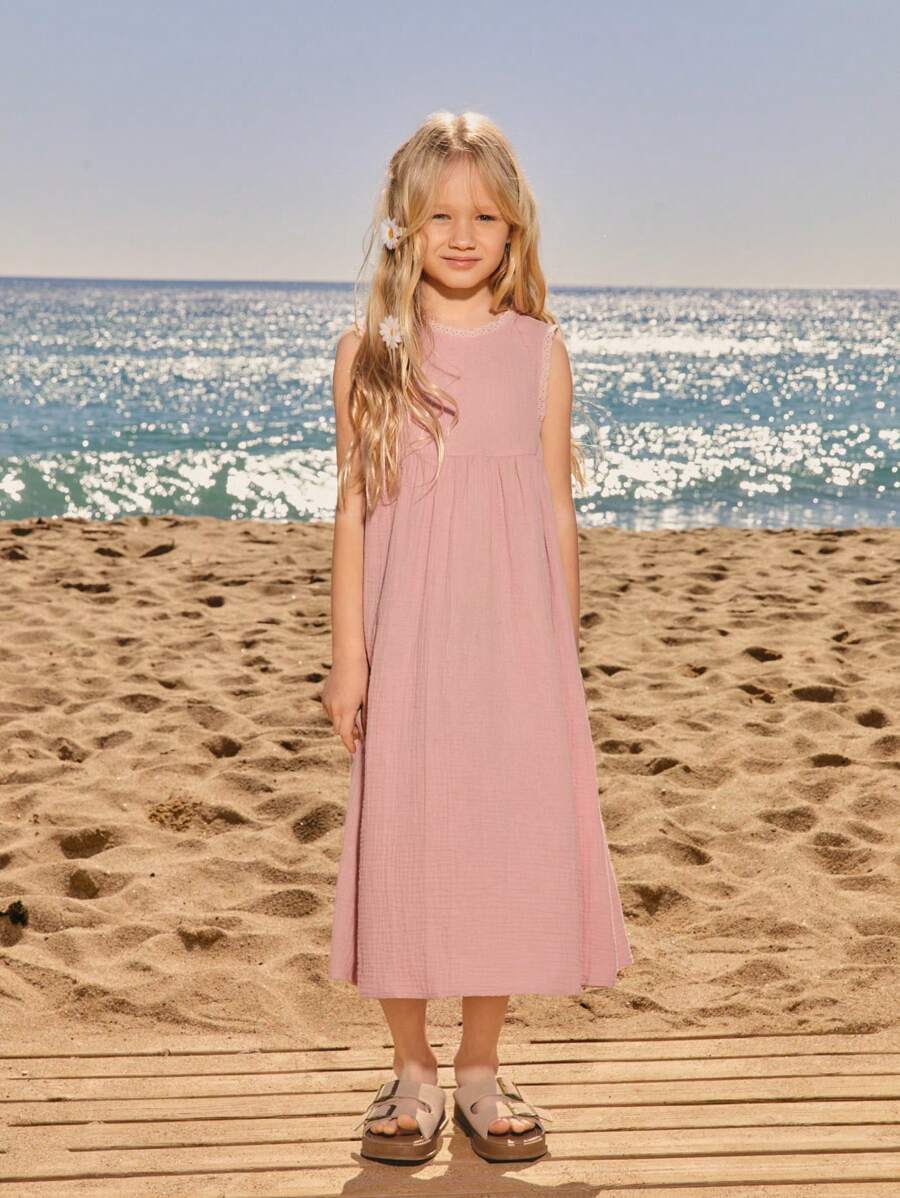 SHEIN Vestido casual suelto de unicolor, cuello redondo y sin mangas para niñas jóvenes