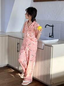 Conjunto de pijama de 2 piezas con pantalón y top de manga corta con bolsillo con botones y cuello tipo polo en color melocotón para niñas preadolescentes