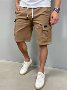 Manfinity Homme Men's Solid Color Flap Pockets Drawstring Waist Cargo Shorts