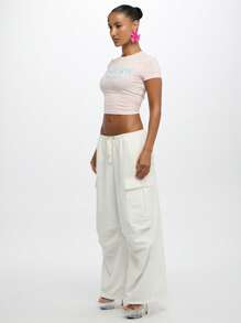 SUMWON WOMEN Camiseta corta de estilo Y2K con mangas cortas, ajustada, para verano, festivales, fiestas, clubes y uso urbano