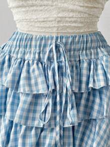 Flirla Jupe mini à taille élastique avec ourlet froncé et imprimé écossais grandes tailles