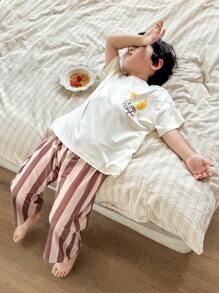 SHEIN Young Boys Casual 2 Pieces Set - Minimalist Star & Moon Graphic Short Sleeve Top & Plaid Wide Leg Pants, Loungewear - White - View 1