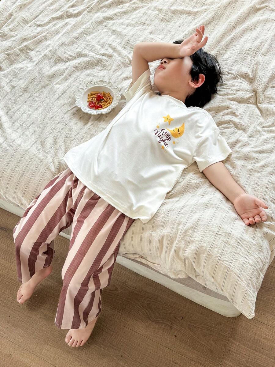 SHEIN Young Boys Casual 2 Pieces Set - Minimalist Star & Moon Graphic Short Sleeve Top & Plaid Wide Leg Pants, Loungewear - White - View 1