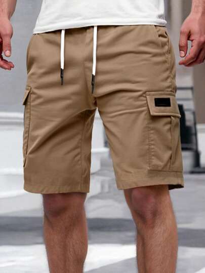 Manfinity Homme Men's Solid Color Flap Pockets Drawstring Waist Cargo Shorts